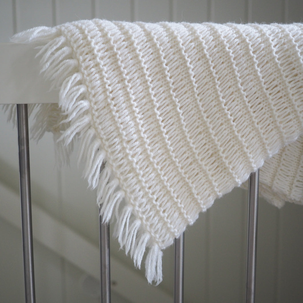 Perlemors frynseteppe